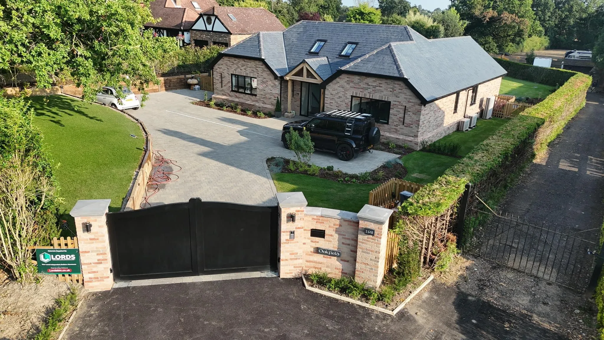 new build house with gated driveway